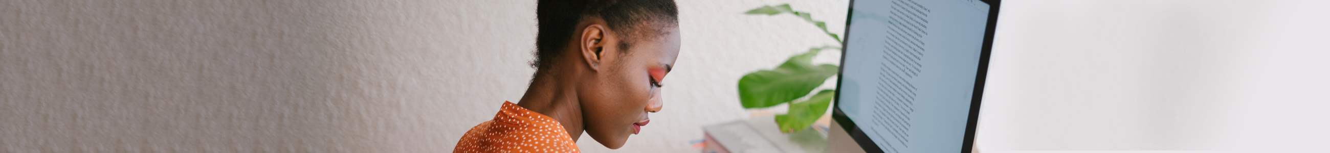 Image of woman in front of computer screen